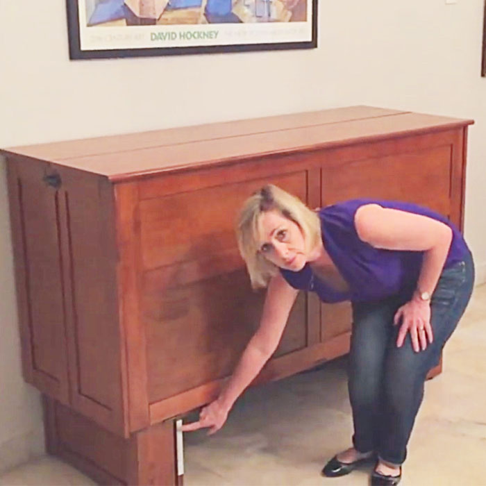 This cabinet will turn in to a bed in seconds