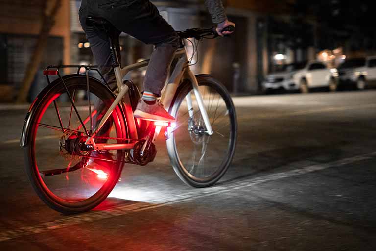 The pedaling motion creates a distinctive and instantly recognizable light pattern.