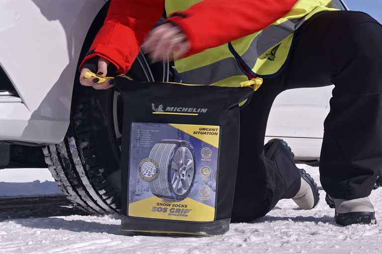 The Michelin SOS Grip snow socks for tires are quicker than snow chains