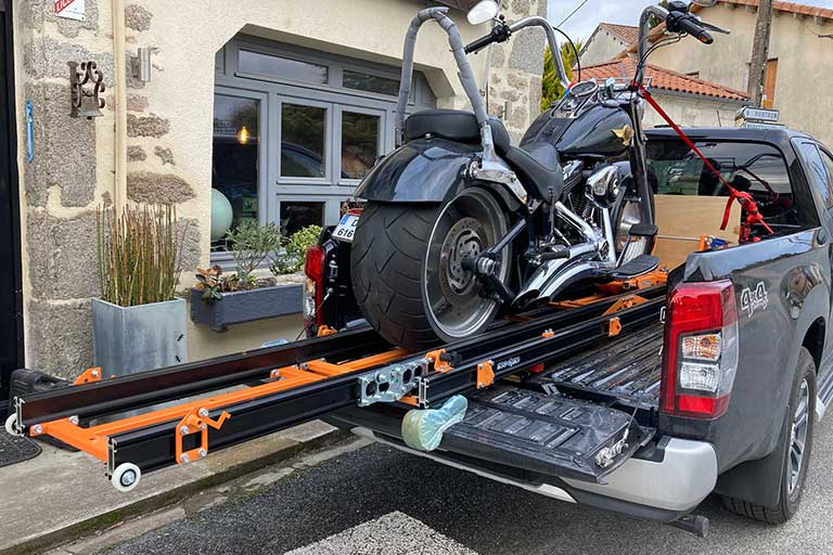 The Neo-dyne motorcycle loading ramp was powered by a cotdless drill