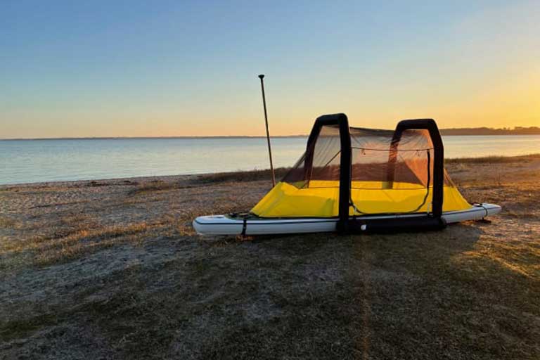 The BAJAO Cabin camp on water tent turns any SUP into a floating tent