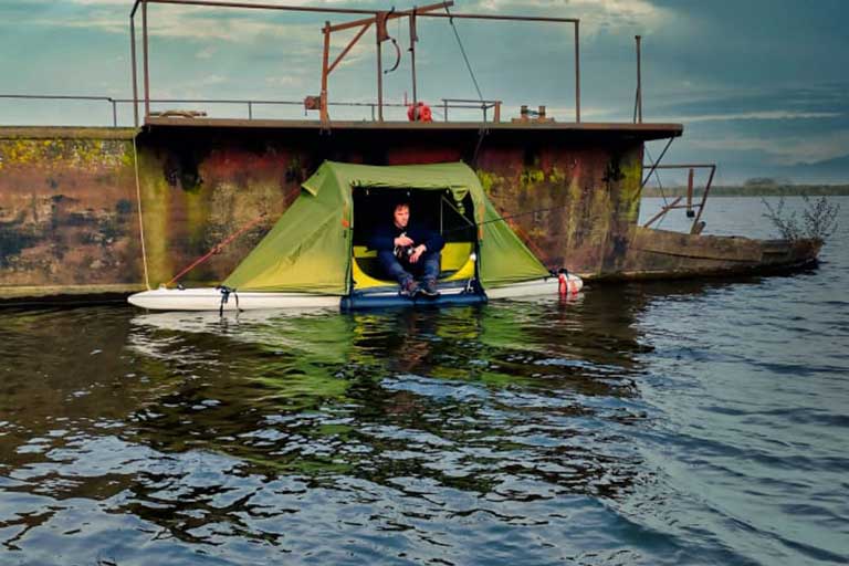 The BAJAO Cabin camp on water tent turns any SUP into a floating tent
