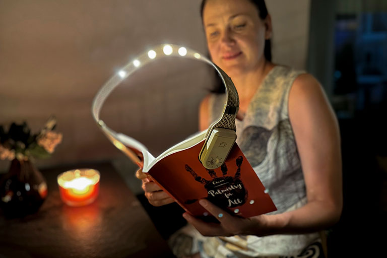 Clip on the Bowio 2.0 book light for smart bedtime reading TheSuperBOO!