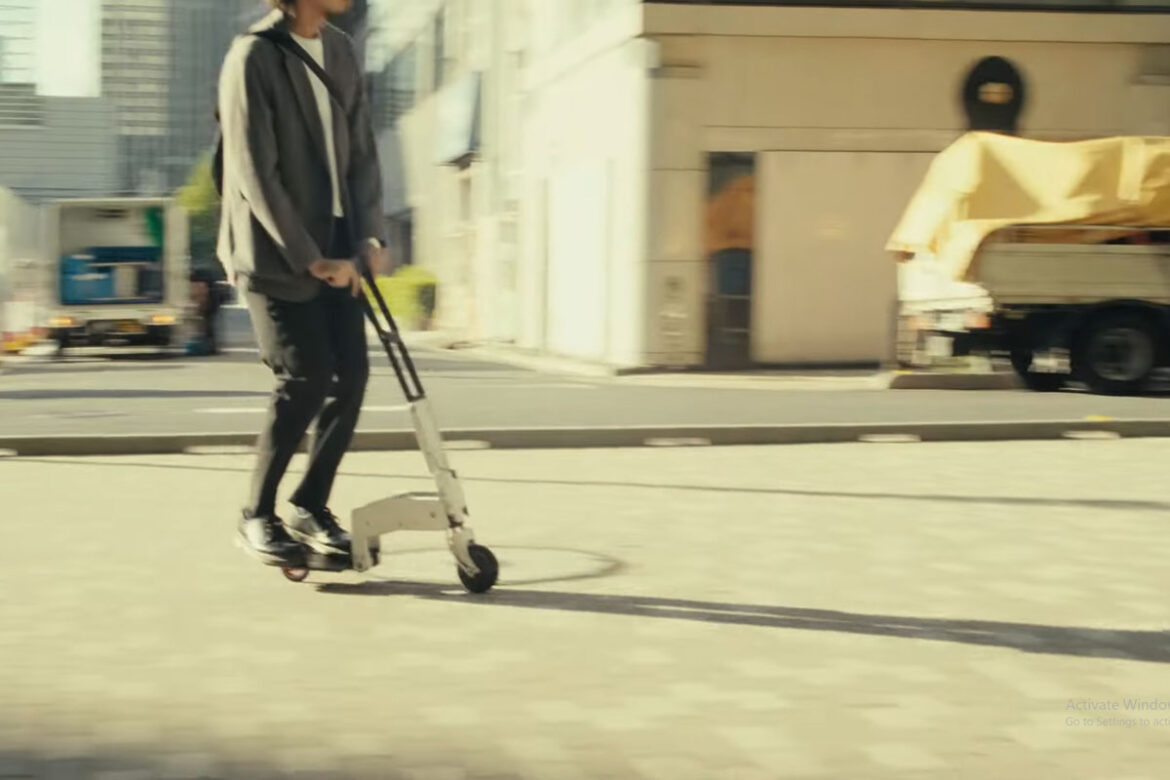 Ultra lightweight folding scooter for adults that collapses to the size of a laptop