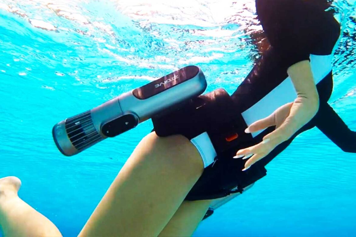 Diver exploring the underwater world with the ZTDIVE Underwater Waist Scooter.