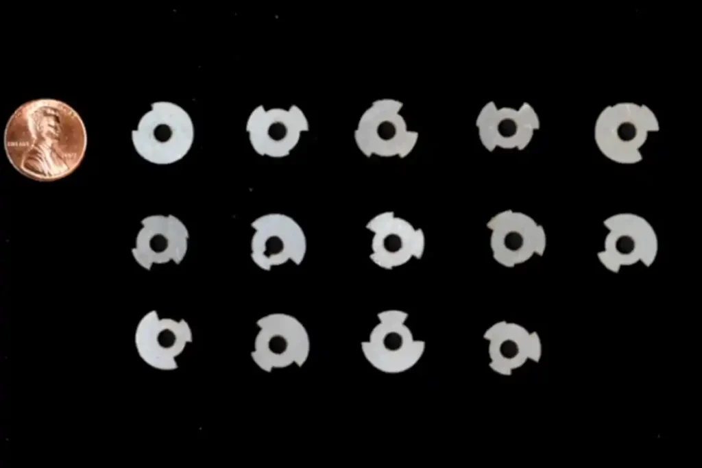 Uniquely shaped metal tags used for ultrasonic sensing.