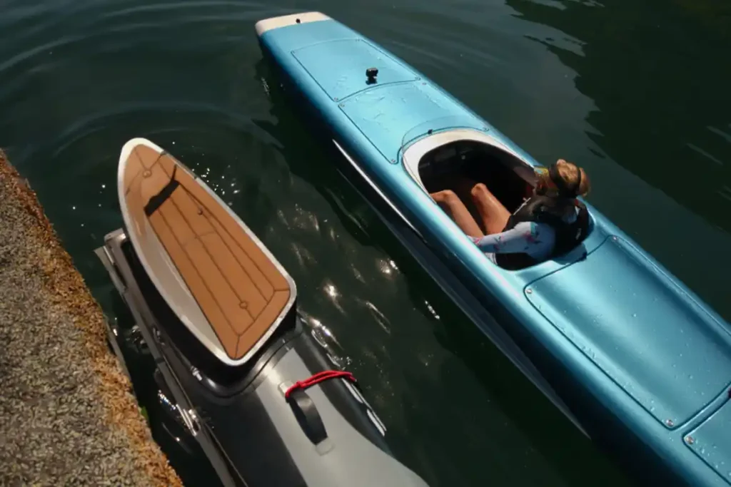 Hydrofoils lifting the hull above the surface.